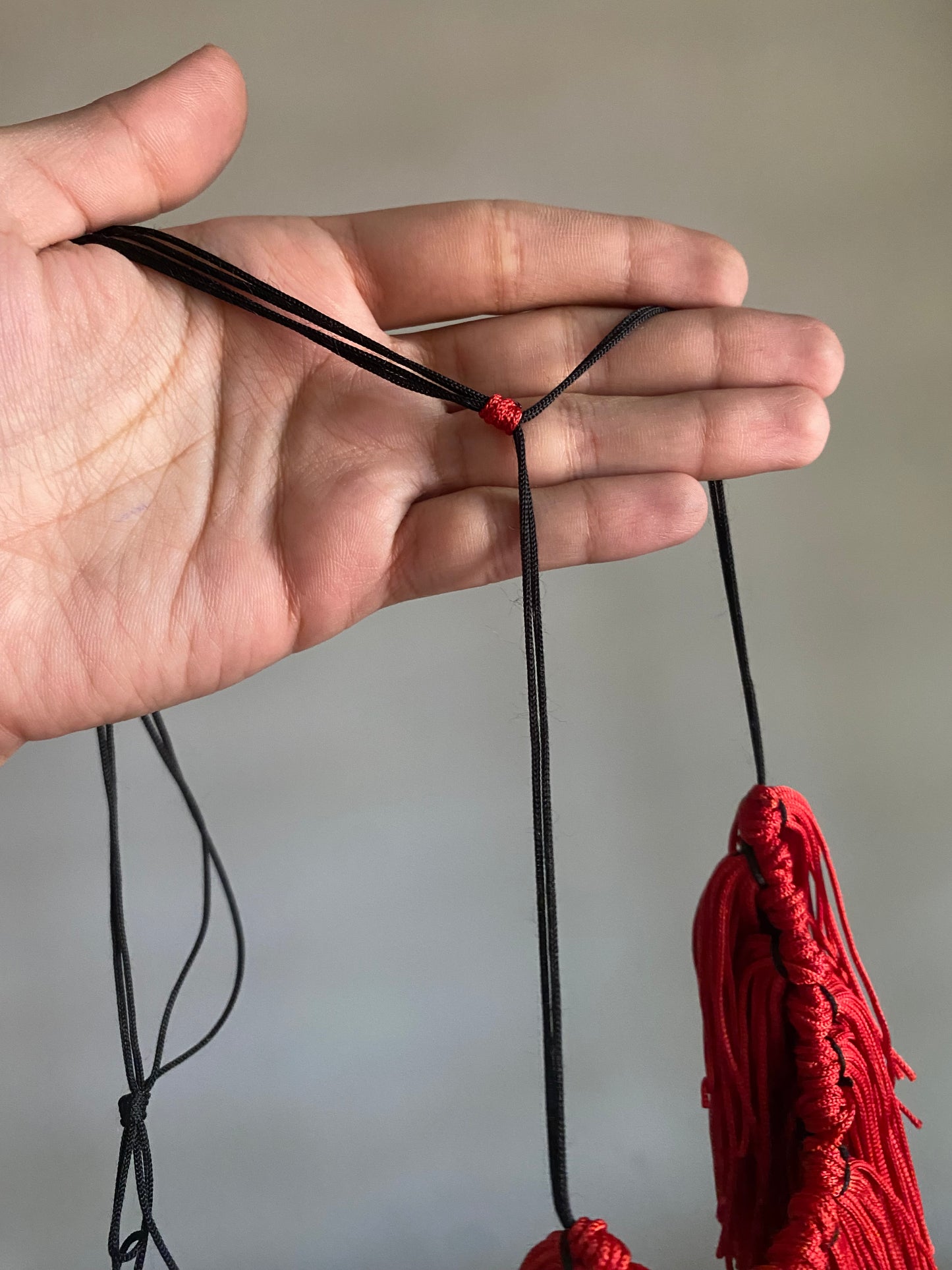 RED TASSEL CHOKER NECKLACE