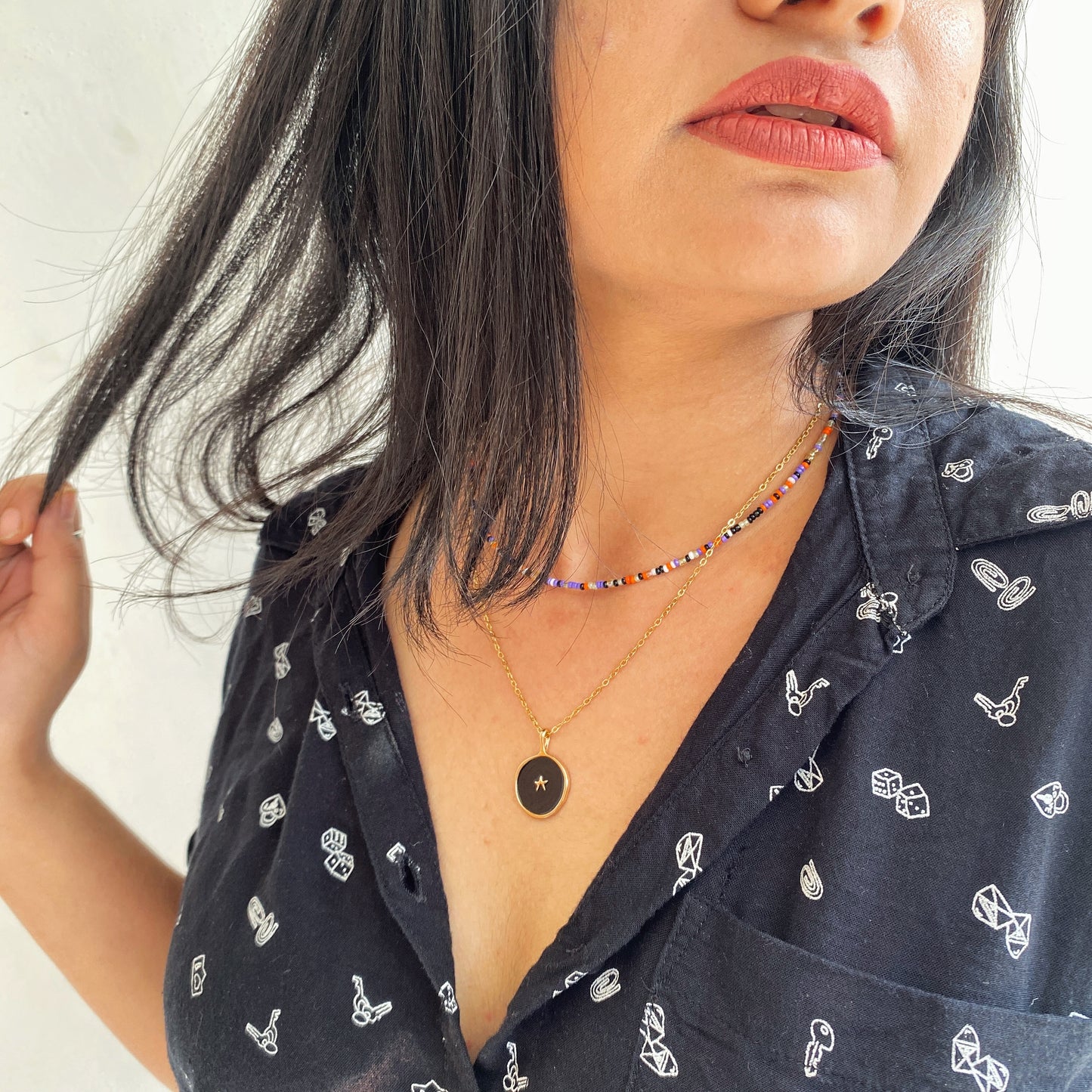 DOUBLE LAYER BLACK STAR NECKLACE