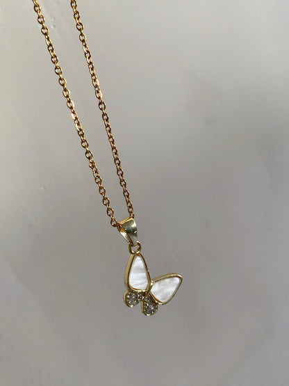 BUTTERFLY PLAYING ON A GOLDEN CHAIN - NECKLACE