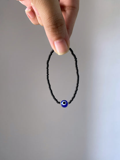 MINIMAL BLACK BEADED EVIL EYE BRACELET