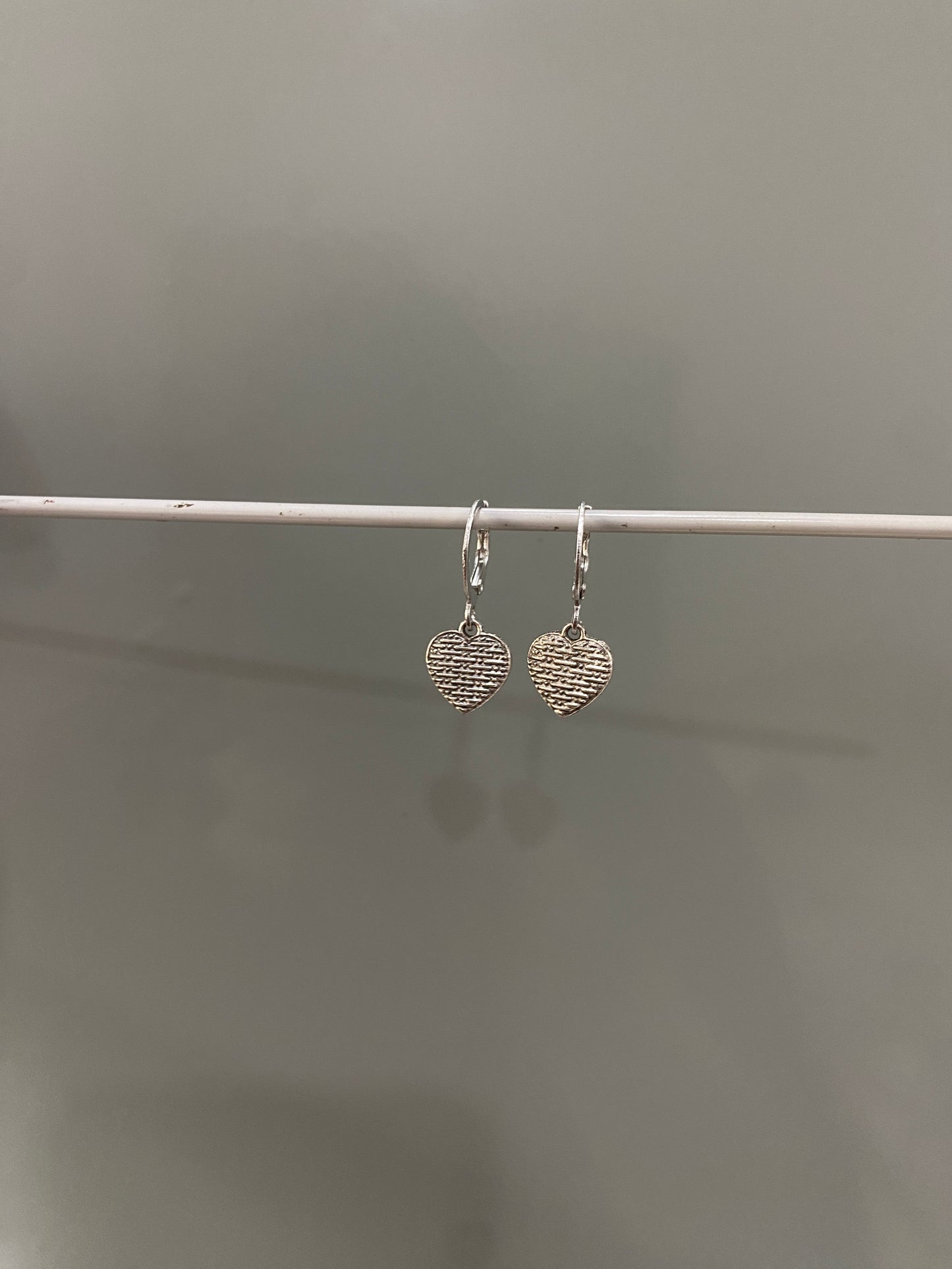 SILVER HEART HUGGIE EARRINGS