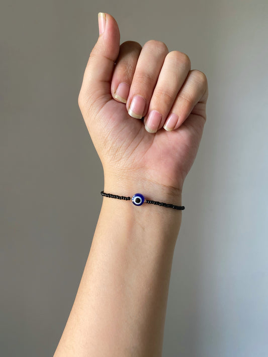 MINIMAL BLACK BEADED EVIL EYE BRACELET